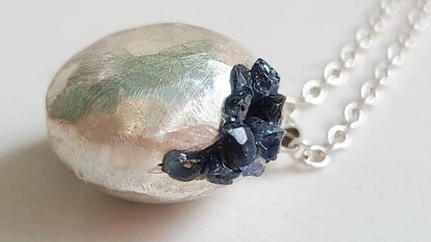 Out of the Blue Sterling Silver Necklace with Blue Sapphire pieces on pendant